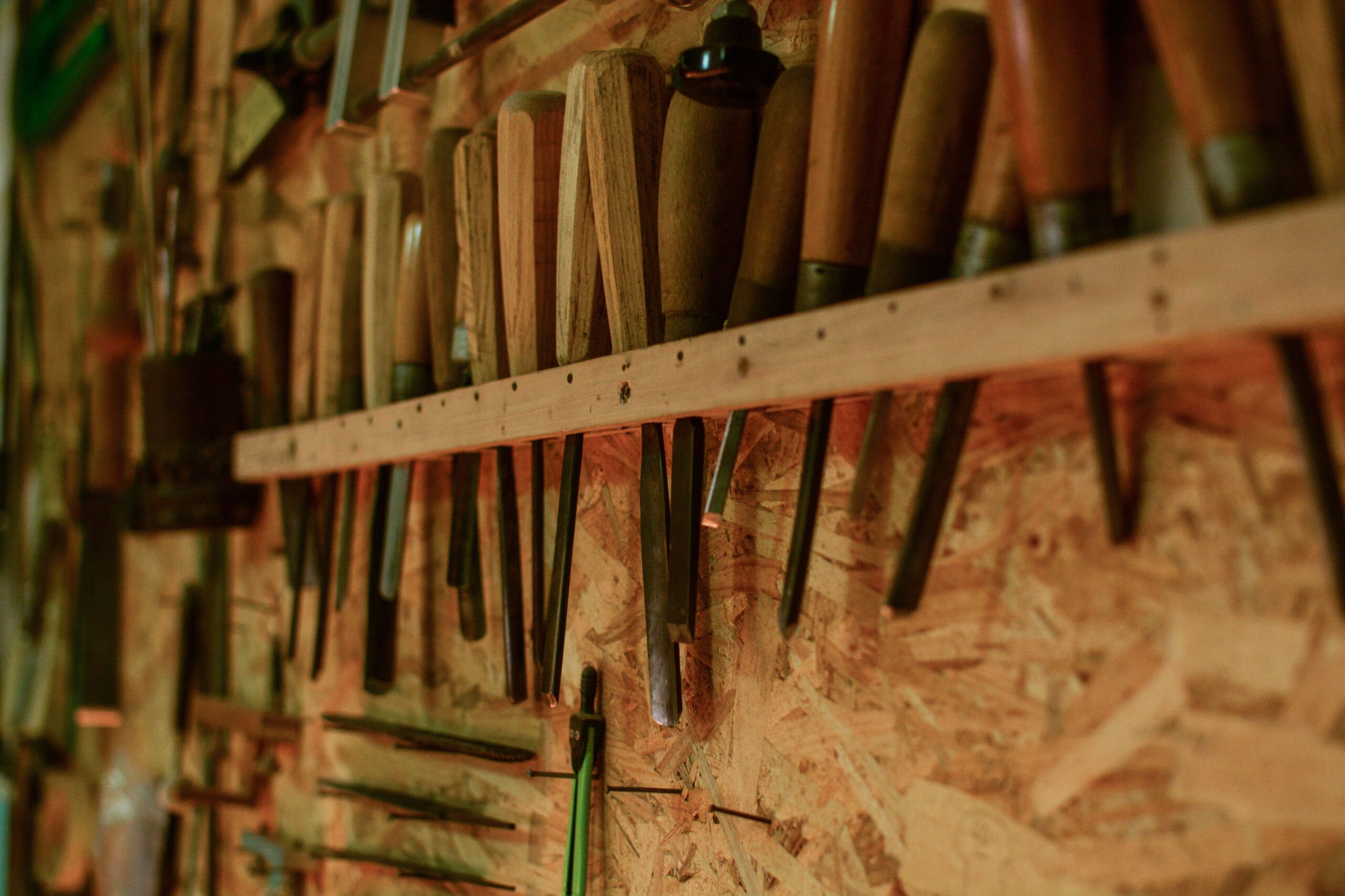 Wood boards and basic tools for building renter-safe shelves